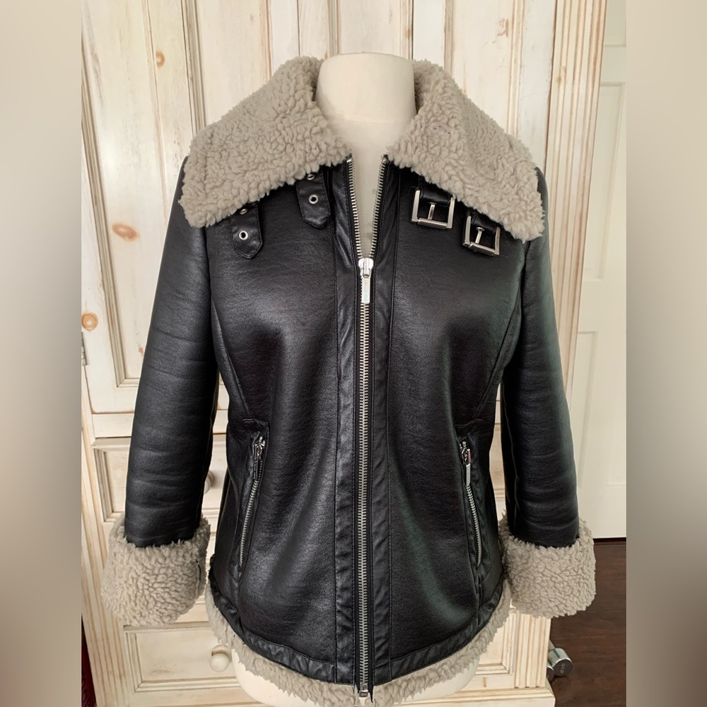 Michael Kors black moto faux shearling jacket.